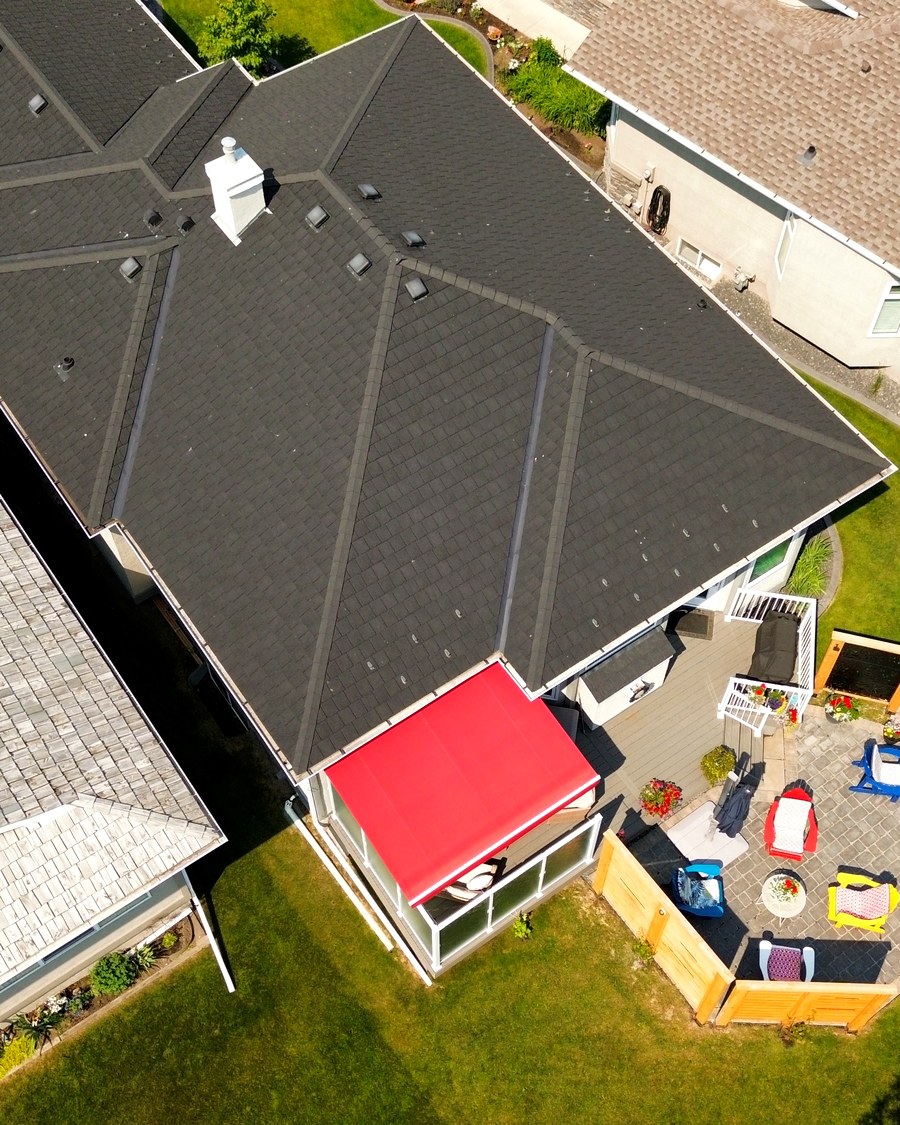 Same property, backyard patio and water feature from above