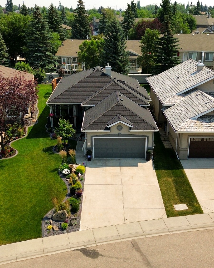 Real drone photo of a front-yard listing shoot in SW Calgary